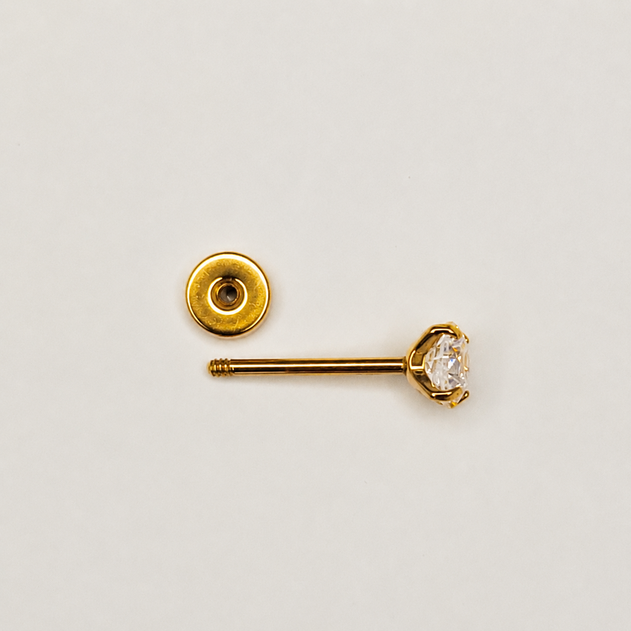 Gold Titanium 4 mm CZ Lobe Stud Earrings — Pair