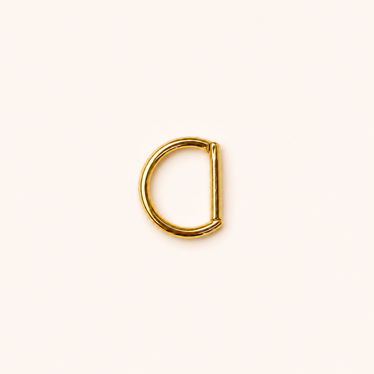 Gold Titanium D-Shaped Clicker Ring